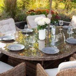 Luxury Rattan 8 Seater Oval Garden Dining Set by Primrose Living 7 Luxury Rattan 8 Seater Oval Garden Dining Set by Primrose Living -Garden Furniture Shop Natural FU102220 4 TableClose2 62a4